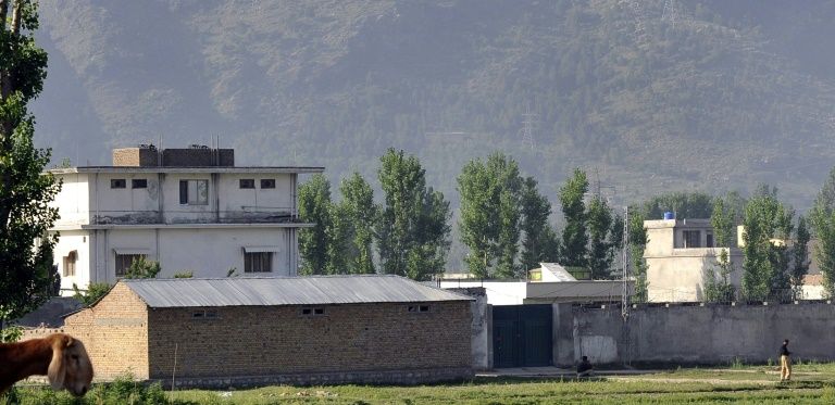 Police in Abbottabad, Pakistan stand guard outside the hideout of Al-Qaeda leader Osama bin Laden, who was killed in a raid by US Special Forces in May 2011. — AFP
