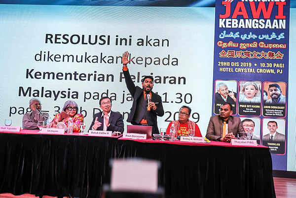 Gabungan Seni Khat Action Group (Sekat) national secretary Arun Dorasamy (standing) speaks during the National Jawi Congress at Crystal Crown Hotel, Petaling Jaya. — Sunpix by Adib Rawi Yahya