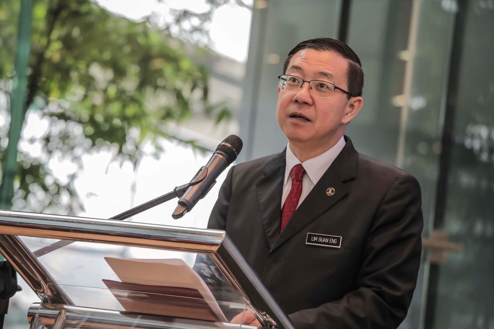 Between development and managing debts, you can’t take sides: Guan Eng