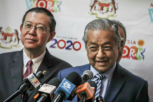Prime Minister Tun Dr Mahathir Mohamad (centre) speaking during the International Social Well-Being Conference 2019 and the launching of Malaysia@Work at Grand Hyatt Hotel, Kuala Lumpur today. — Sunpix by Adib Rawi Yahya