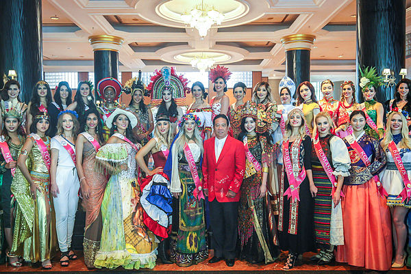 D’Touch International Managing Director Tan Sri Danny Ooi with Miss Tourism International contestants during the press event for the 21st Miss Tourism International 2018 World Final at Sunway Resort Hotel &amp; Spa, Subang Jaya. — Sunpix by Adib Rawi Yahya