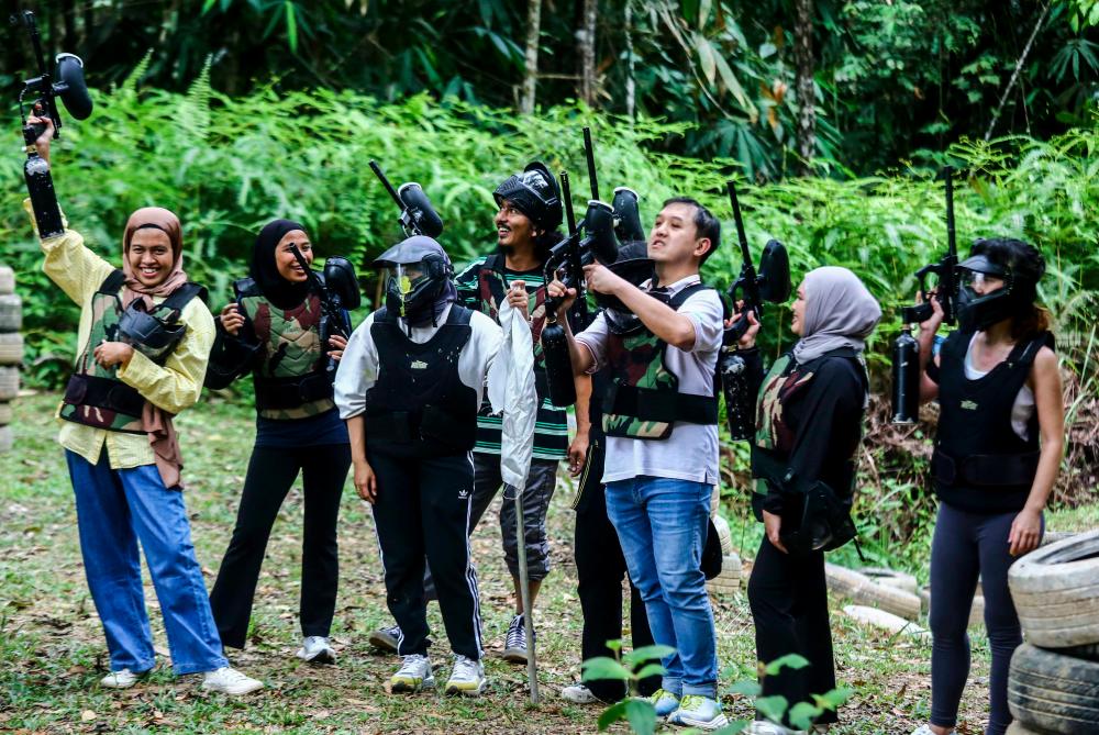 $!The paintball game is strictly conducted with clear safety protocols to prevent injuries.