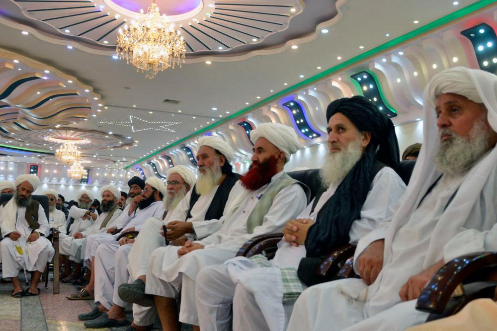 Taliban religious scholars attend a public meeting on economic welfare at a private salon in Kandahar on August 18, 2022. - AFPPIX