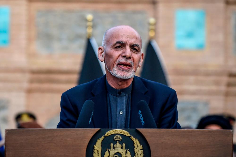 Afghanistan's President Ashraf Ghani speaks during a press conference also attended by NATO Secretary General Jens Stoltenberg and US Secretary of Defense Mark Esper at the presidential palace in Kabul on February 29, 2020. - AFP