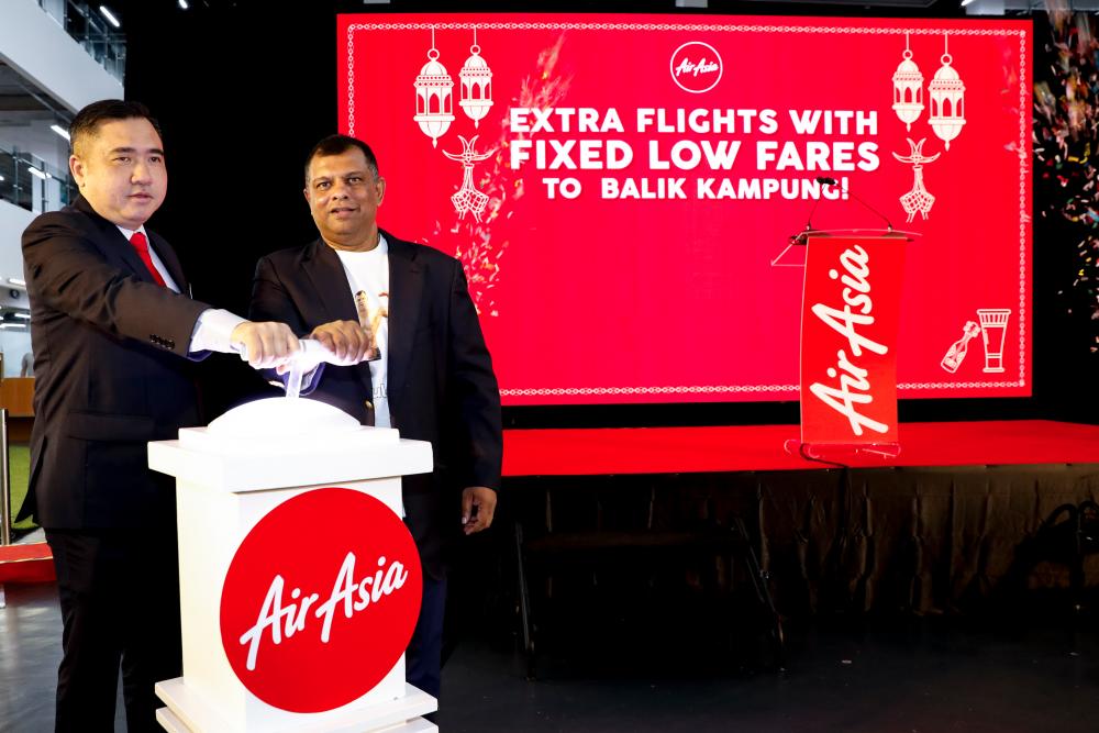 Loke (left) and Fernandes at the launch of the new promotion.