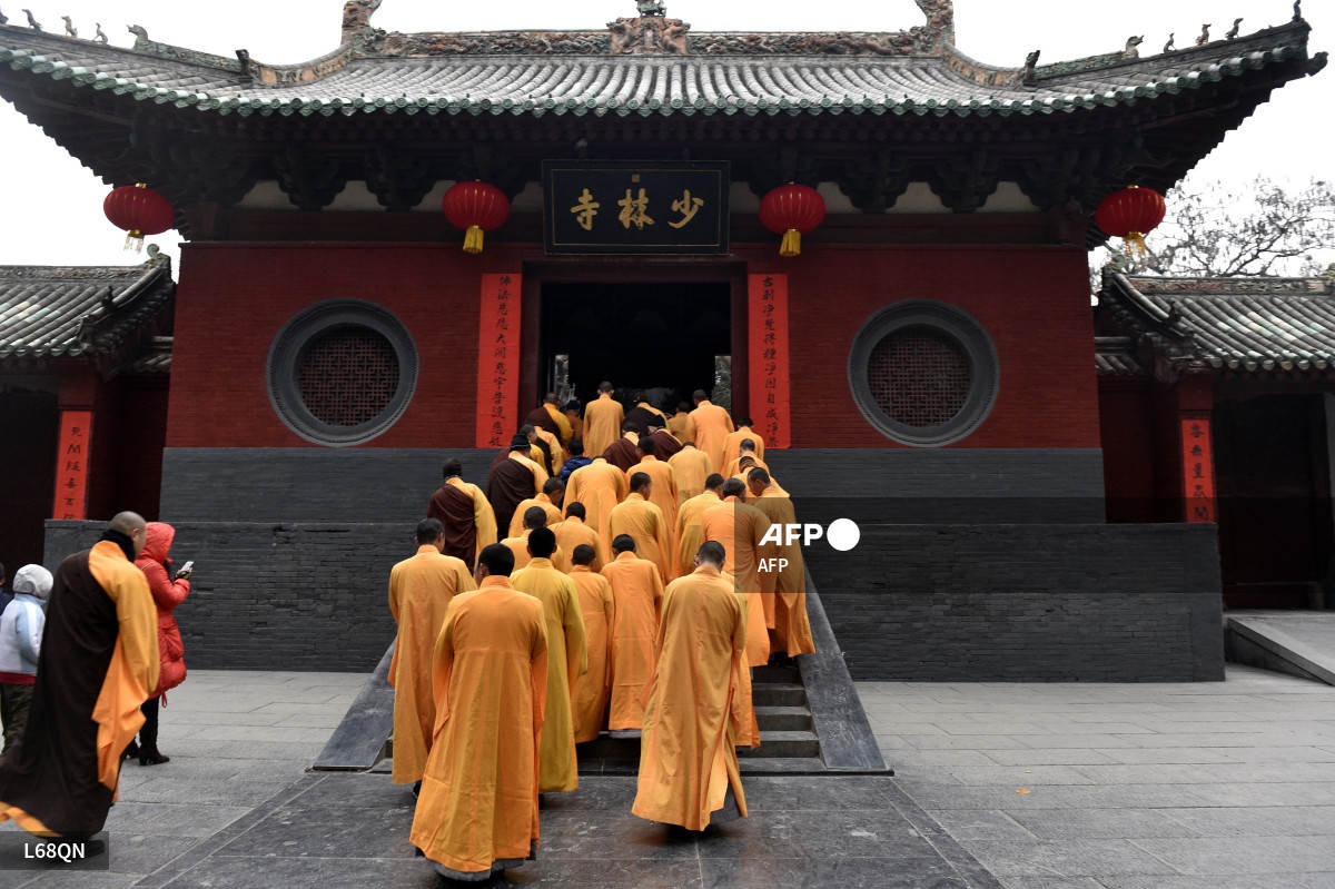 In this photo taken on January 28, 2017, Chinese monks attend a ceremony at a Shaolin Temple, the birthplace of Chinese Buddhism, to celebrate the Lunar New Year in Dengfeng, Henan province. - AFP