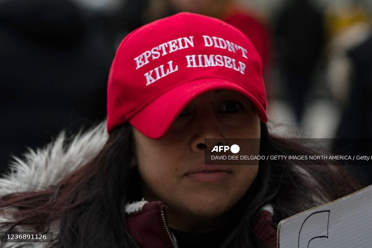 People gather to protest human trafficking at the Thurgood Marshall United States Courthouse where the trial of Ghislaine Maxwell is being held on November 29, 2021 in New York City. - AFP