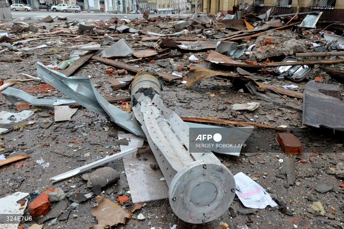 A view shows the internal components of a 300mm rocket which appear to contained cluster bombs launched from a BM-30 Smerch multiple rocket launcher in Ukraine’s second-biggest city of Kharkiv on March 3, 2022, following Russia’s invasion of Ukraine. - Sergey BOBOK / AFP