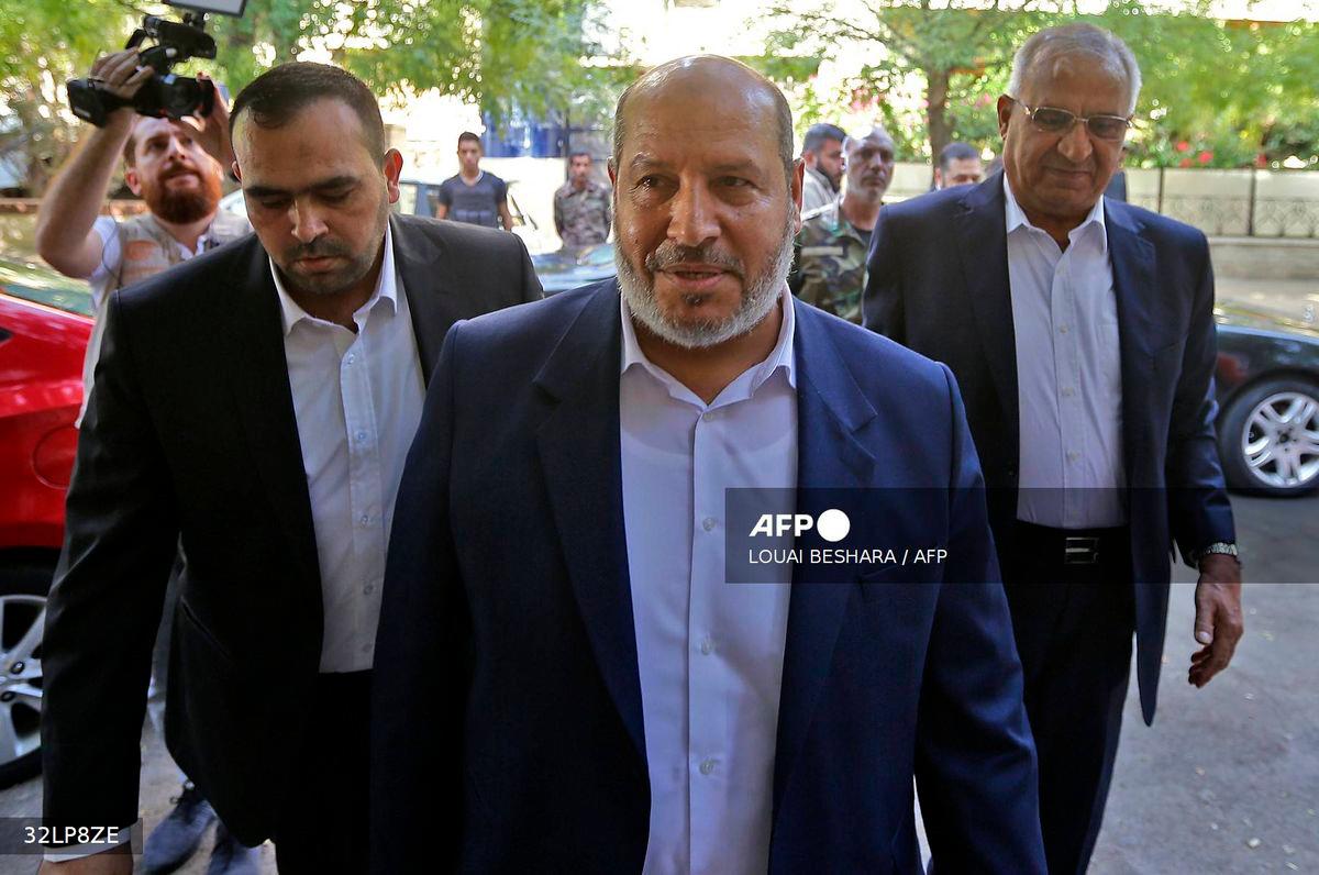 Hamas’s top negotiator Khalil al-Hayya (c) - (Photo by Louai Beshara / AFP)