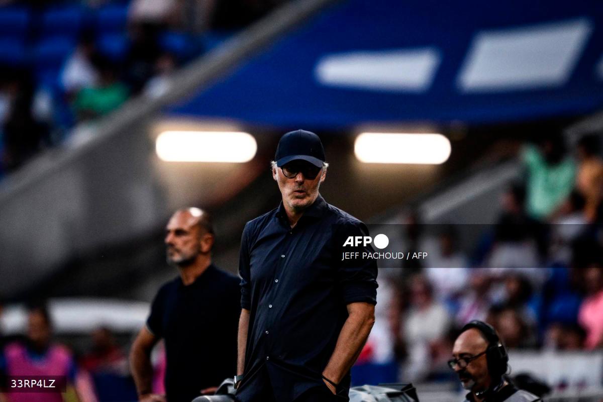Laurent Blanc reacts during the French L1 football match between Olympique Lyonnais (OL) and Montpellier Herault Sport Club (Montpellier Herault SC) at The Groupama Stadium in Decines-Charpieu, central-eastern France on August 19, 2023. (Photo by JEFF PACHOUD / AFP)