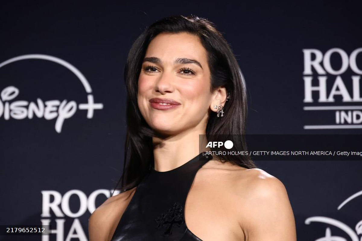 Dua Lipa poses in the press room during the 2024 Rock &amp; Roll Hall Of Fame Induction Ceremony streaming on Disney+ at Rocket Mortgage Fieldhouse on October 19, 2024 in Cleveland, Ohio. - Getty Images via AFP