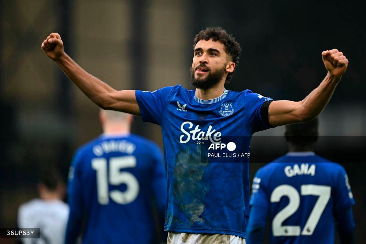 Everton's English striker #09 Dominic Calvert-Lewin celebrates creating their third goal, an own-goal from Tottenham Hotspur's English midfielder #14 Archie Gray during the English Premier League football match between Everton and Tottenham Hotspur at Goodison Park in Liverpool, north west England on January 19, 2025. - AFP