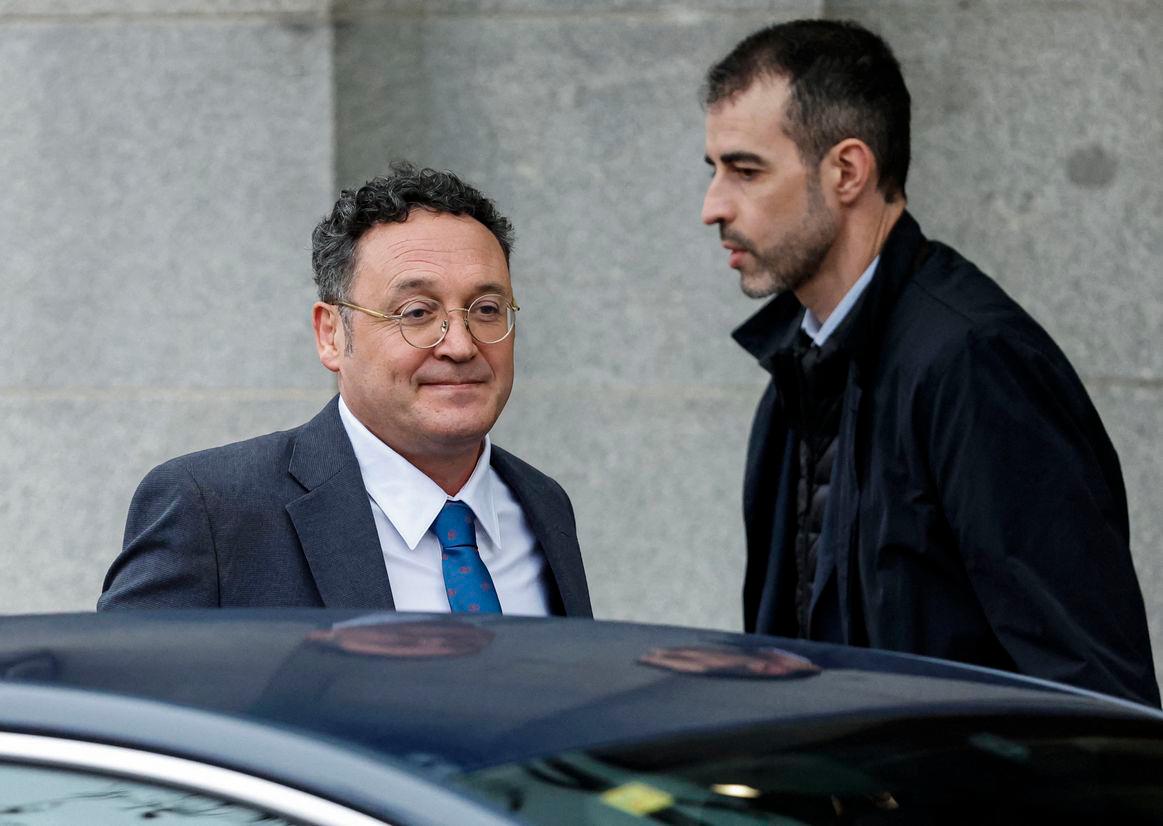 Spain’s top prosecutor Alvaro Garcia Ortiz (L) leaves the Supreme Court in Madrid on January 29, 2025. Spain’s top prosecutor Alvaro Garcia Ortiz arrived at the Supreme Court to testify as a suspect in a legal leaks case, one of several affairs embarrassing Prime Minister’s minority leftist government. (Photo by OSCAR DEL POZO / AFP)