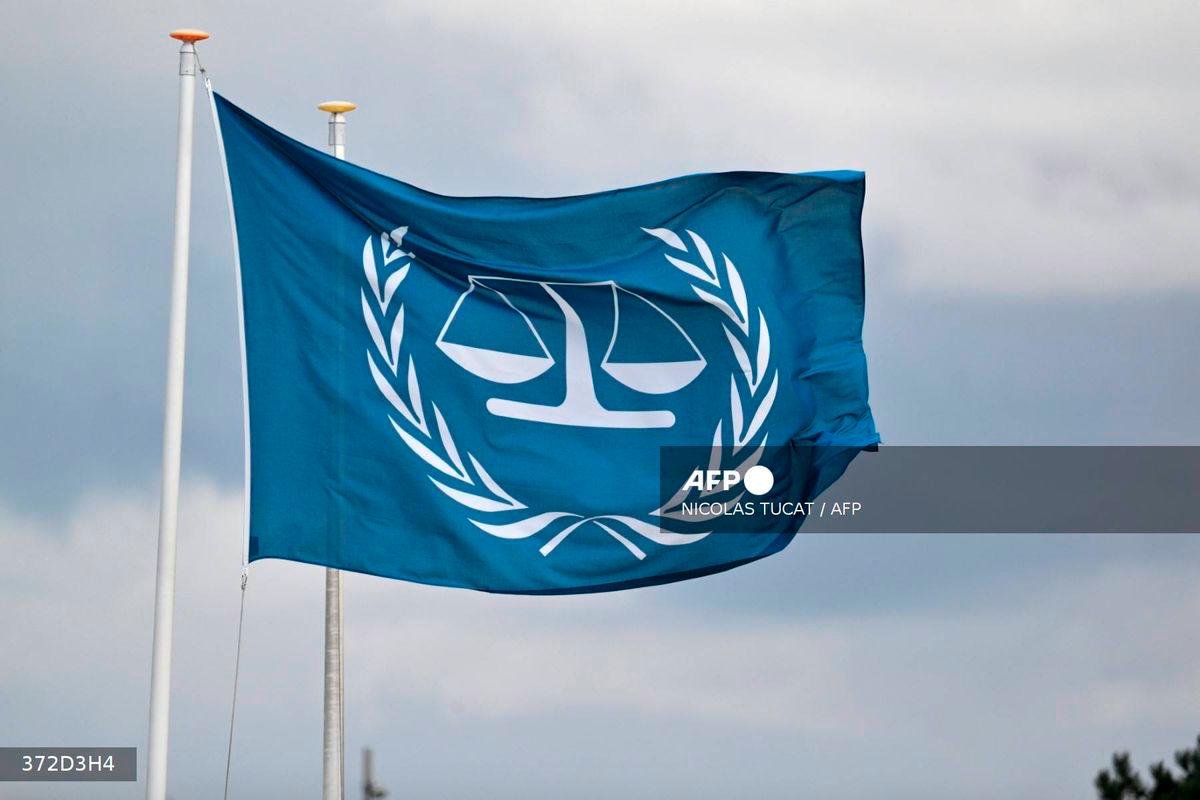 This photograph taken on March 14, 2025 shows a flag fluttering outside the International Criminal Court (ICC) in The Hague. - AFP