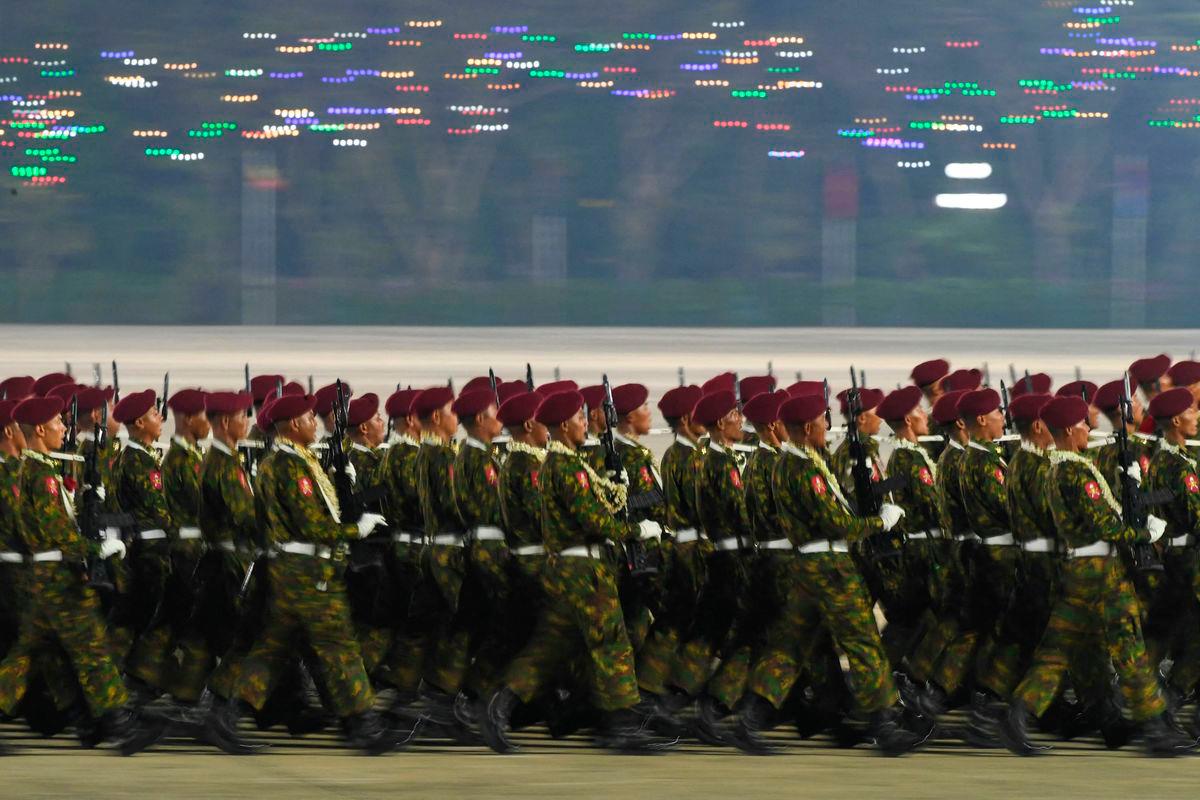 Myanmar junta military soldiers parade during a ceremony to mark the country’s Armed Forces Day in Naypyidaw on March 27, 2025. Myanmar’s junta chief insisted on March 27 that a planned election will go ahead despite the country’s spiralling civil war, in a speech to thousands of soldiers and dignitaries at the annual Armed Forces Day parade. (Photo by AFP)