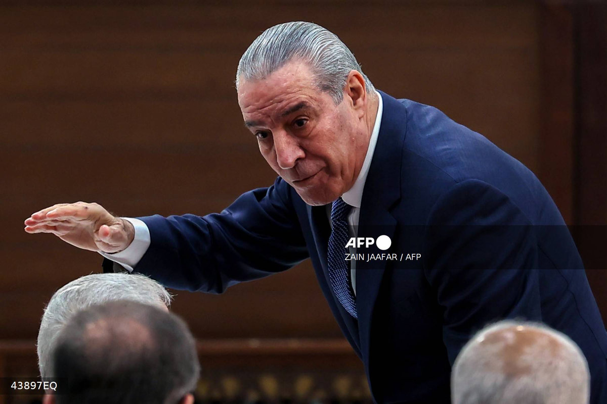 Hussein al-Sheikh, deputy to Palestinian Authority president Mahmud Abbas, gestures as he arrives for the 32nd Palestinian Liberation Organization (PLO) Central Council session in Ramallah on April 23, 2025. - AFP