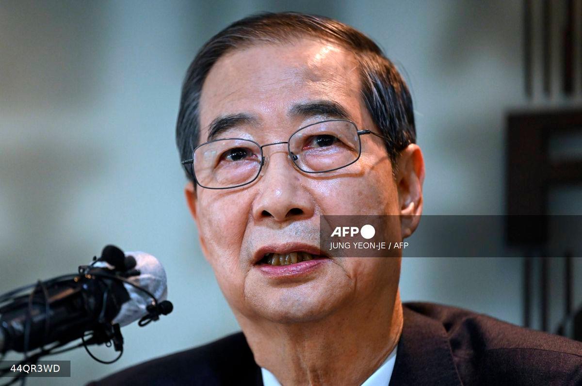 Former South Korean prime minister Han Duck-soo - (Photo by Jung Yeon-je / AFP)