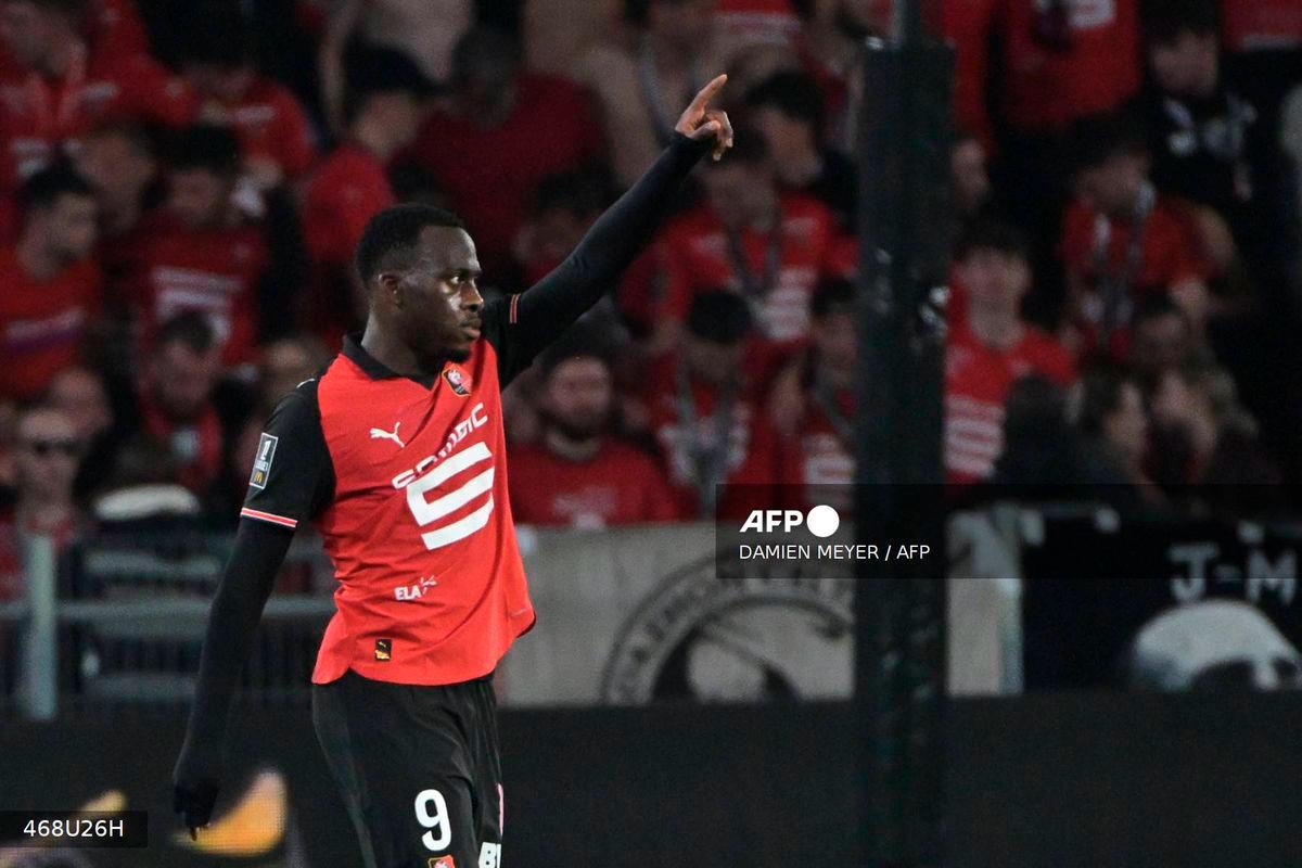 Rennes’ French forward #09 Arnaud Kalimuendo celebrates after scoring during the French L1 football match between Stade Rennais FC and OGC Nice at Roazhon Park stadium in Rennes, western France on May 10, 2025. - AFP