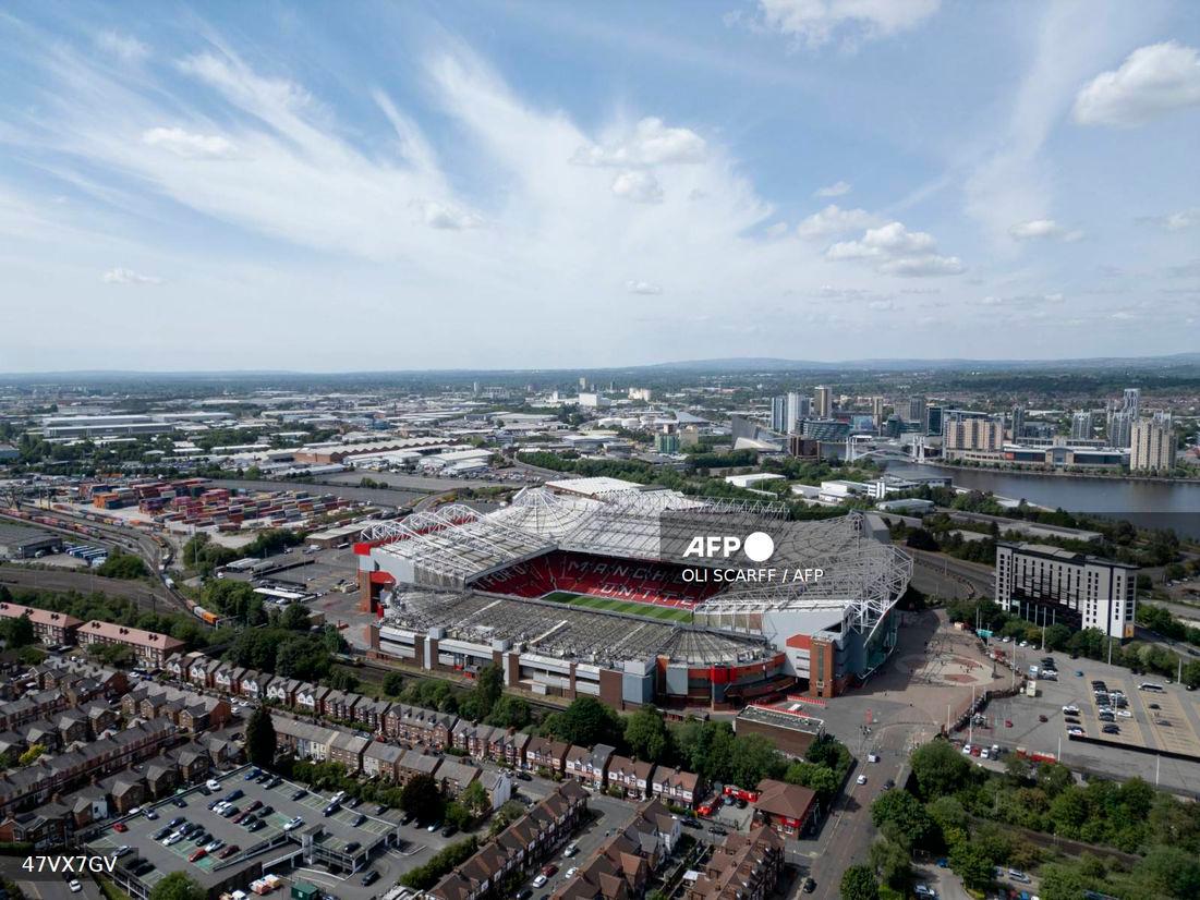 An aerial view shows Old Trafford stadium, home ground of Manchester United Football Club. - (Photo by Oli SCARFF / AFP)