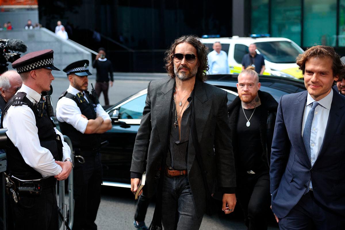 British comedian and actor Russell Brand (C) arrives to Southwark Crown Court in south London on May 30, 2025 - AFPpix