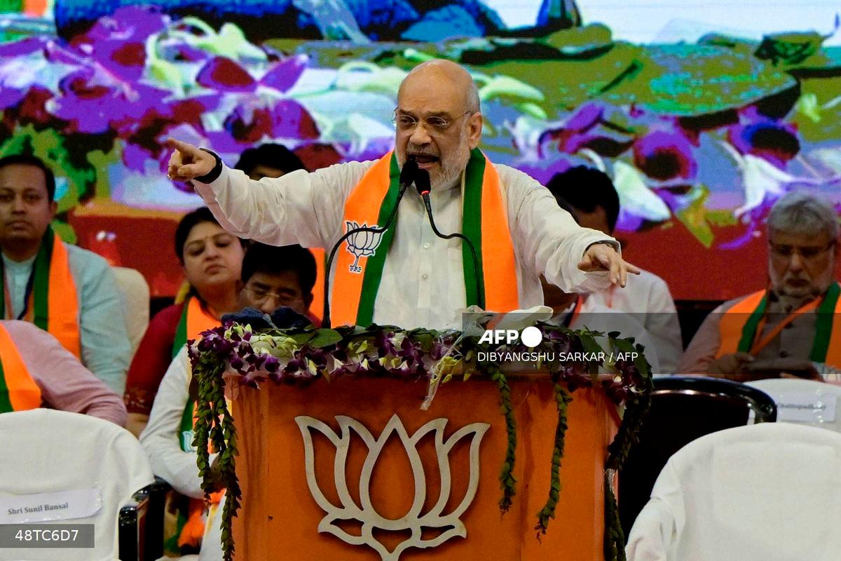 Amit Shah, India’s Minister of Home Affairs and leader of the Bharatiya Janata Party (BJP) addresses party activists during a gathering in Kolkata on June 1, 2025. (Photo by Dibyangshu SARKAR / AFP)