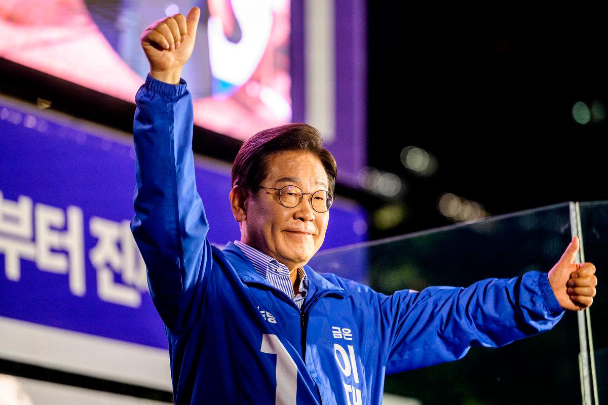 Lee Jae-myung, the presidential candidate for South Korea’s Democratic Party, gestures onstage during his final election campaign event ahead of the upcoming June 3 presidential election in Seoul on June 2, 2025. (Photo by Anthony WALLACE / AFP)