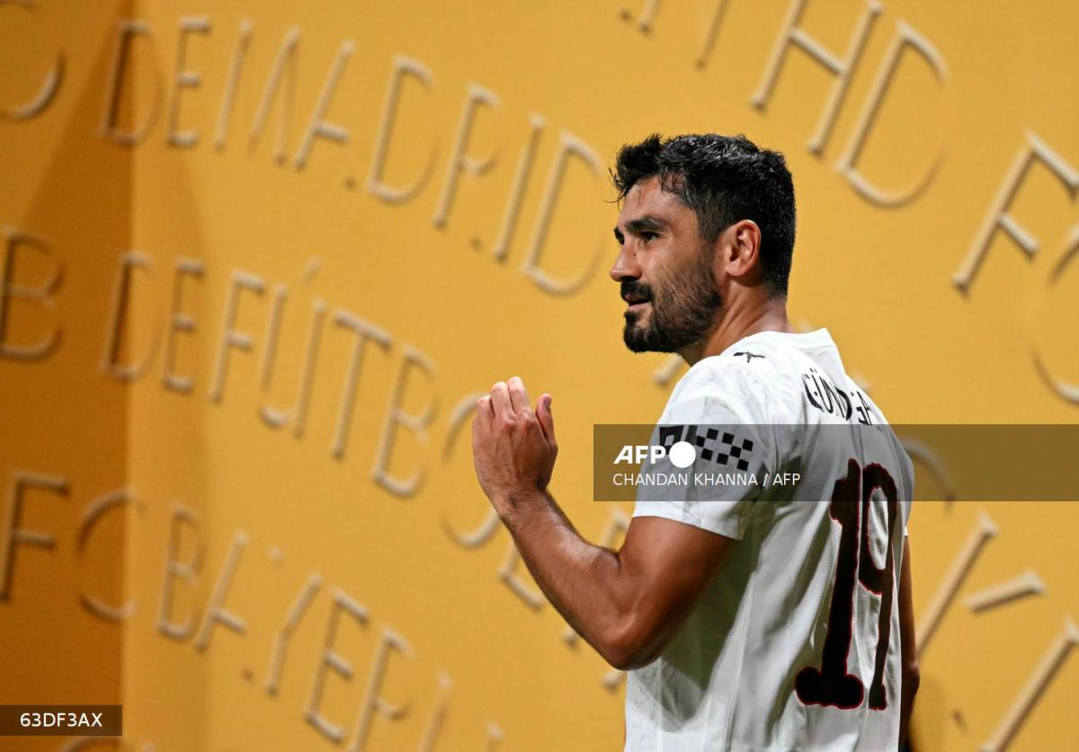 Manchester City's German midfielder #19 Ilkay Gundogan gestures during the FIFA Club World Cup 2025 Group G football match between England's Manchester City and UAE's Al Ain FC at the Mercedes-Benz stadium in Atlanta on June 22, 2025. - AFPPIX