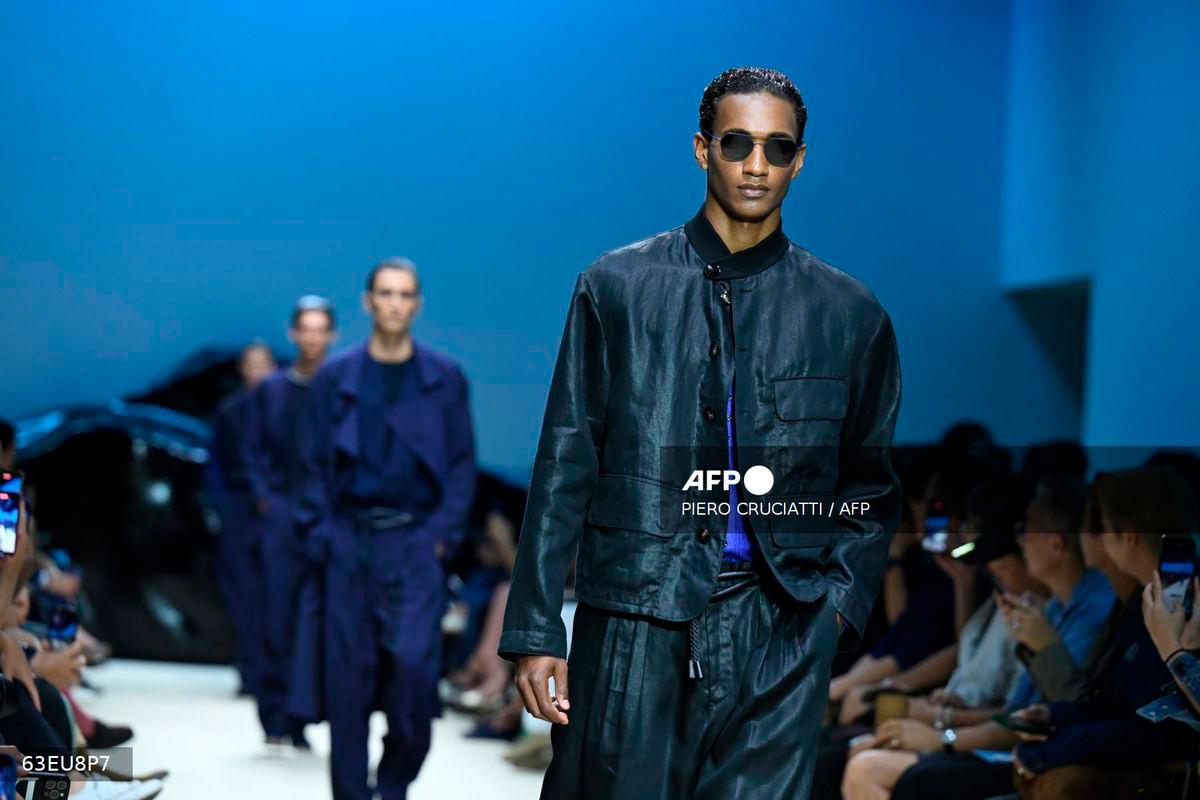 A model walks the runway during the Giorgio Armani collection show at Milan's Fashion Week Menswear Spring / Summer 2026, on June 23, 2025 in Milan. - AFP