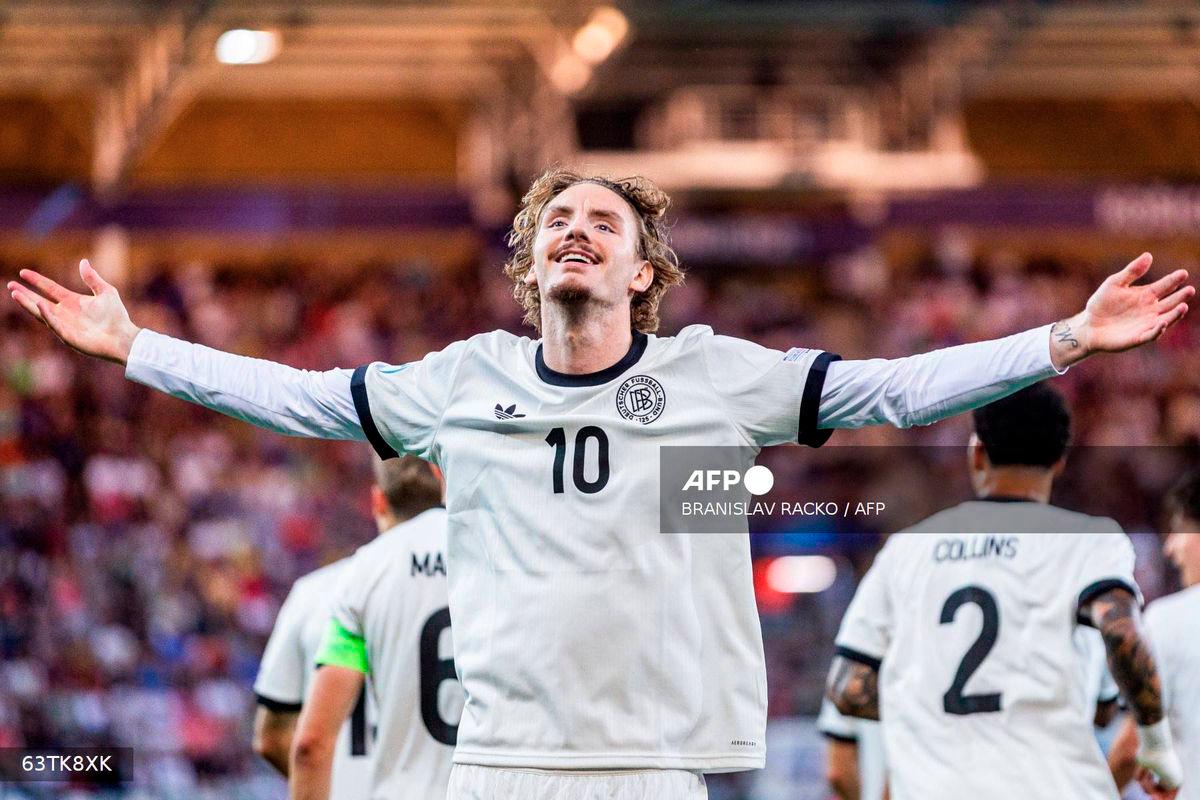 Germany's forward #10 Nick Woltemade celebrates after scoring the 2-0 goal during the UEFA U21 European Championship semi-final football match between Germany and France in Kosice, Slovakia on June 25, 2025. - AFP