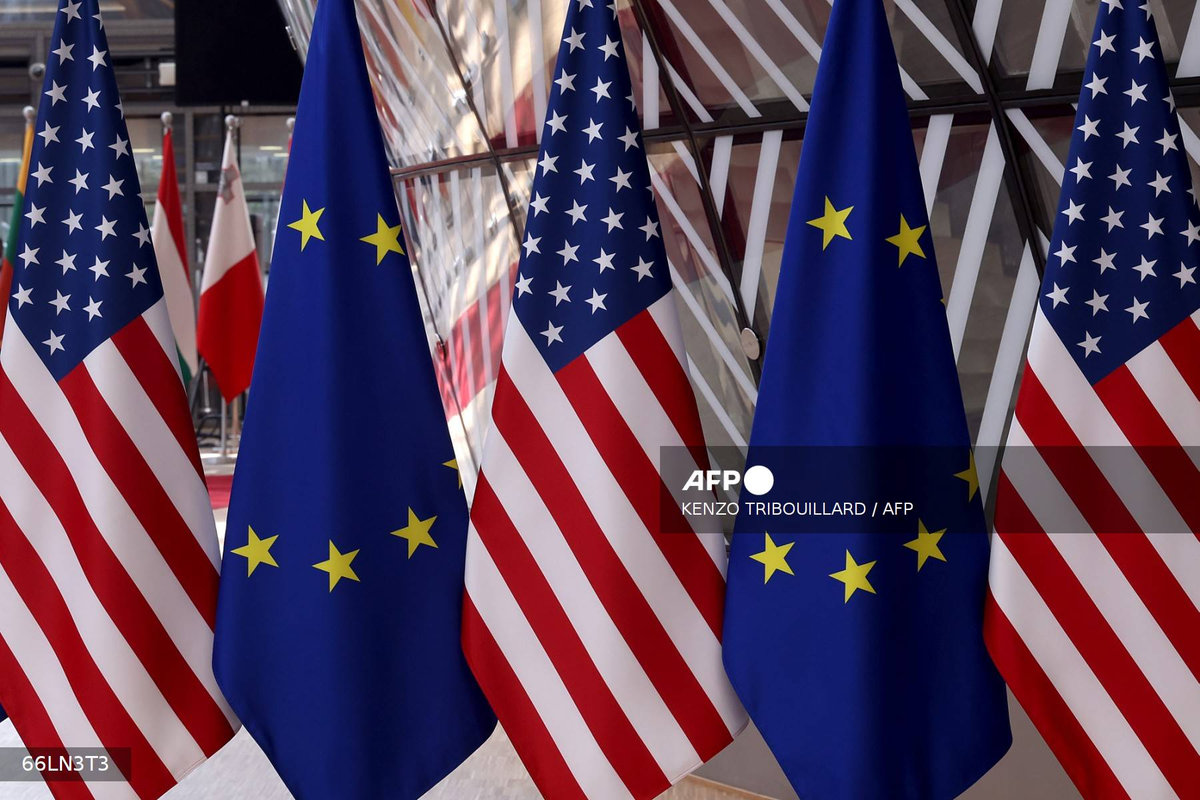 This pictures shows flags prior to an EU - US summit at the European Union headquarters in Brussels on June 15, 2021. - AFP