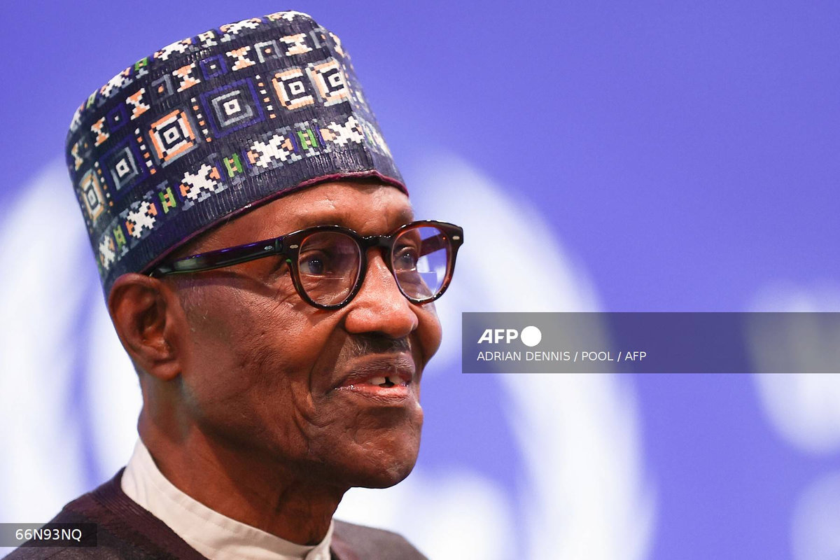 Nigeria’s President Muhammadu Buhari attends the second day of the COP26 UN Climate Summit in Glasgow on November 2, 2021. Former Nigerian president Muhammadu Buhari -- who led his country first as a junta strongman and later as an elected democrat -- died July 12, 2025, at the age of 82, an aide said. - AFP