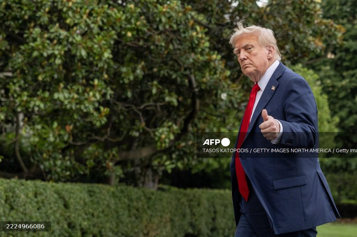 U.S. President Donald Trump walks into the White House on July 13, 2025 in Washington, DC. - Getty Images via AFP