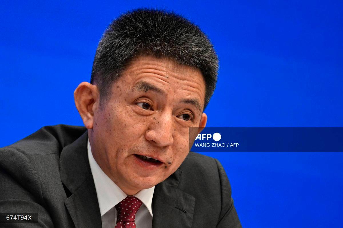 Li Chenggang, China’s International Trade Negotiator and Vice Minister of Commerce, speaks during a press conference in Beijing on July 18, 2025. (Photo by WANG Zhao / AFP)