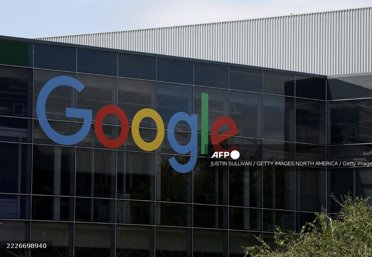 A sign is posted on the exterior of a building on the Google headquarters campus on July 23, 2025 in Mountain View, California. - Getty Images via AFP