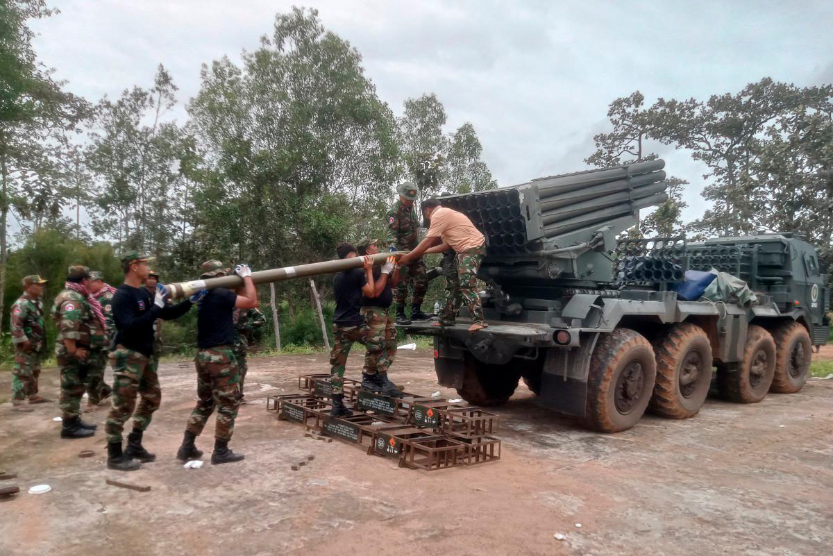 Cambodian soldiers reload the BM-21 multiple rocket launcher in Preah Vihear province on July 24, 2025. (Photo by AFP)