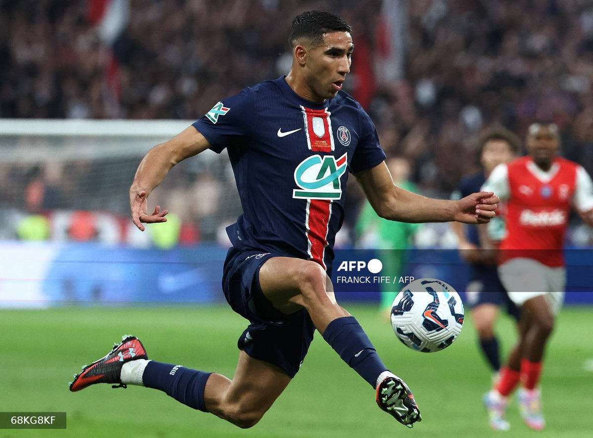 (FILES) Paris Saint-Germain's Moroccan defender #02 Achraf Hakimi runs for the ball during the French Cup final football match between Paris Saint-Germain (PSG) and Stade de Reims at the Stade de France in Saint-Denis, north of Paris, on May 24, 2025. - AFP