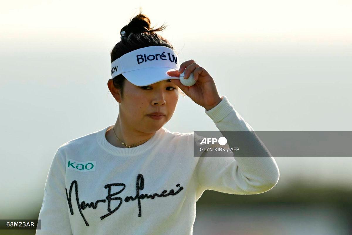 Japan’s Miyu Yamashita walks from the 18th green after putting out on day three of the Women’s British Open Golf Championship, at Royal Porthcawl in south Wales on August 2, 2025. (Photo by Glyn KIRK / AFP)