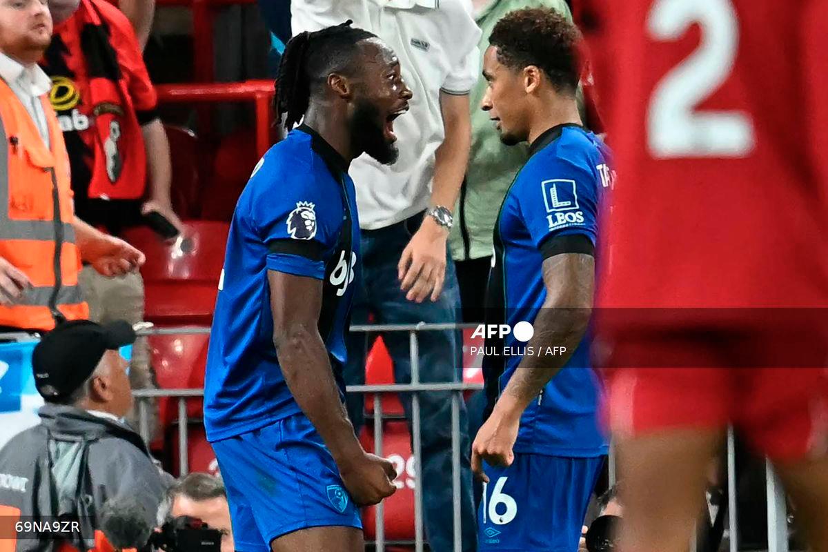 Bournemouth's Ghanaian striker #24 Antoine Semenyo (L) celebrates with Bournemouth's English midfielder #16 Marcus Tavernier (R) after scoring their second goal during the English Premier League football match between Liverpool and Bournemouth at Anfield in Liverpool, north west England on August 15, 2025. - AFP