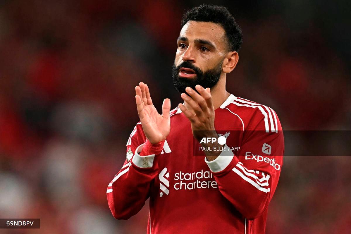 Liverpool's Egyptian striker #11 Mohamed Salah applauds fans after the English Premier League football match between Liverpool and Bournemouth at Anfield in Liverpool, north west England on August 15, 2025. Liverpool won the game 4-2. - AFP