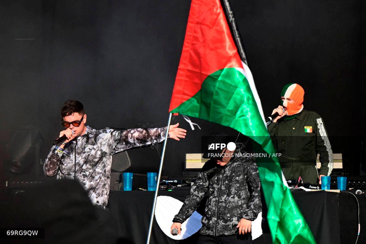 Northern Irish rap band Kneecap performs on stage at the Cabaret Vert festival in Charleville-Mezieres on August 17, 2025. - AFP