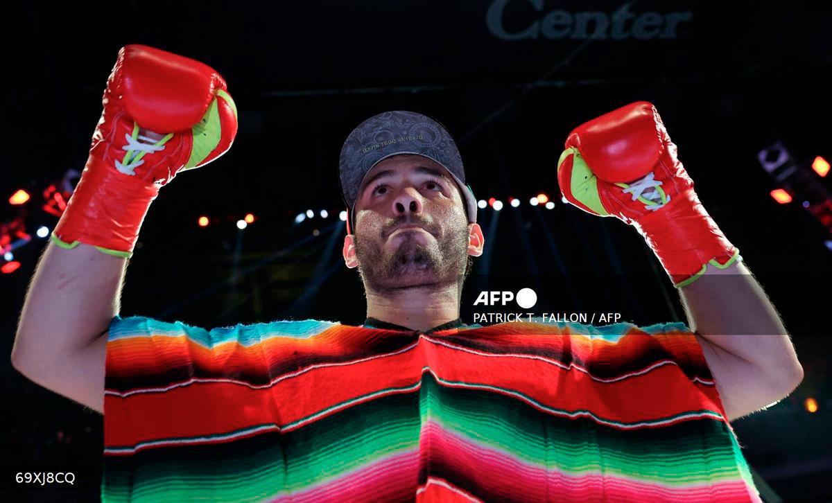 Mexico's Julio Cesar Chavez Jr. enters the ring ahead of his cruiserweight boxing bout against USA's Jake Paul at the Honda Center in Anaheim, California, on June 28, 2025. - AFP