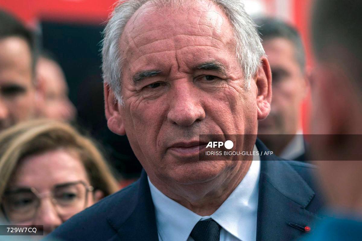 France's Prime Minister Francois Bayrou looks on during a visit to a field command post set up in Saint-Laurent-de-la-Cabrerisse, southern France, where a wildfire has scorched a vast area on August 6, 2025.- AFP