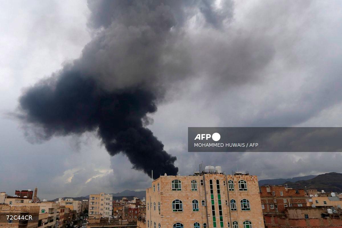 Smoke billows after an Israeli air strike on Yemen's Huthi-held capital Sanaa on August 24, 2025. - AFP