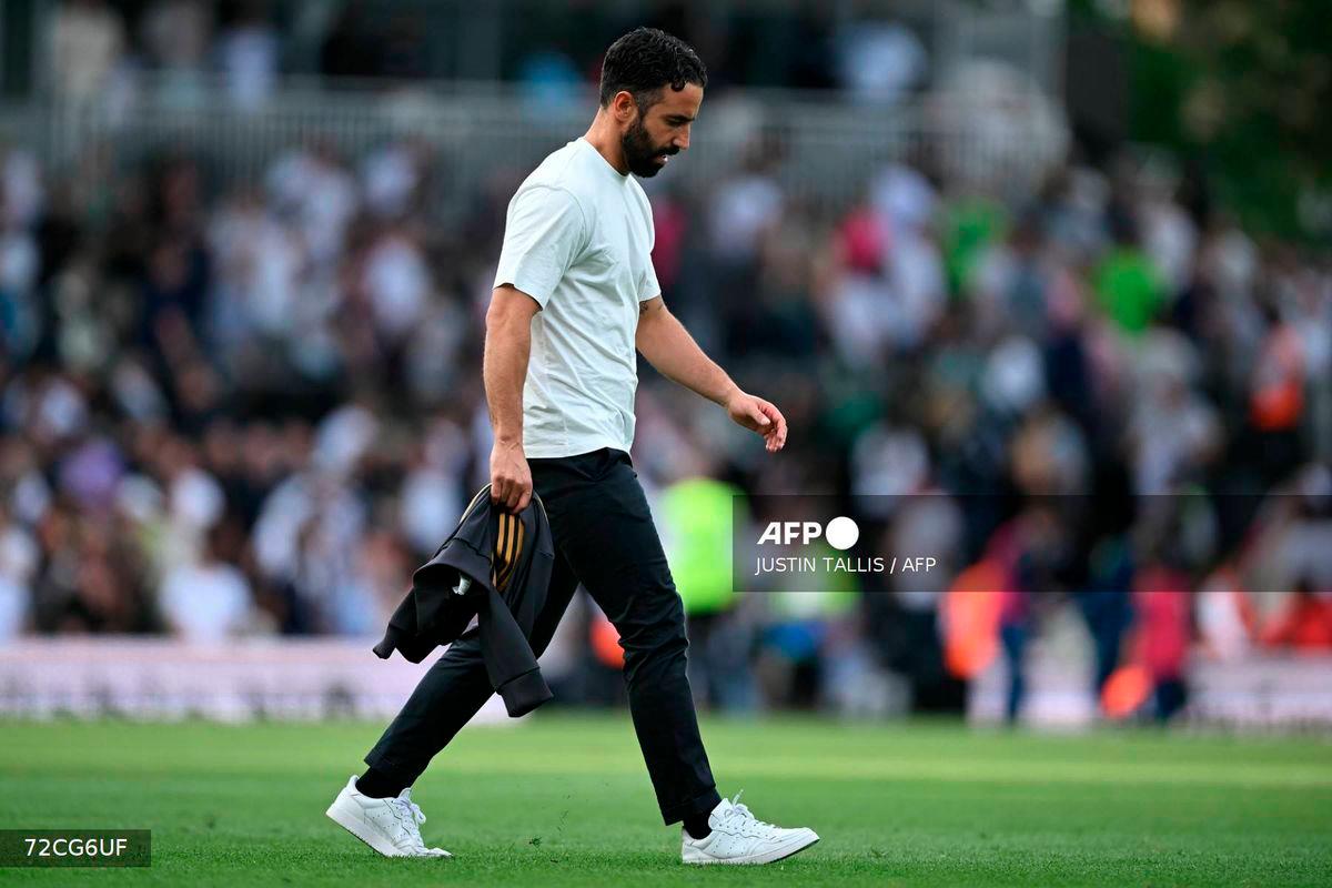 Manchester United's Portuguese head coach Ruben Amorim walks on the pitch after the English Premier League football match between Fulham and Manchester United at Craven Cottage in London on August 24, 2025.- AFP