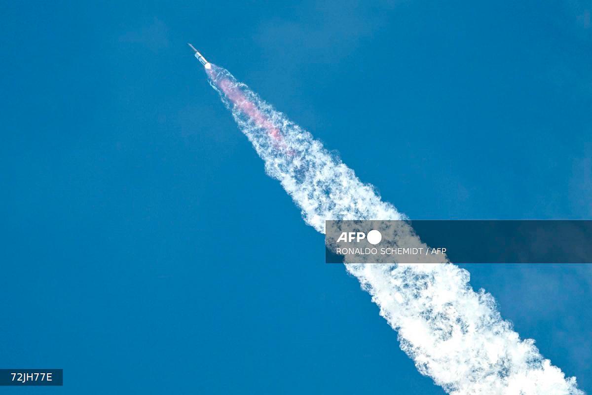 SpaceX’s Starship rocket is seen after lifting off from Starbase, Texas, as seen from South Padre Island on August 26, 2025, for its tenth test flight. SpaceX’s Starship megarocket roared into the skies Tuesday on its 10th test flight, following a string of explosive failures that cast doubt about its ability to realize Elon Musk’s vision of colonizing Mars. - RONALDO SCHEMIDT / AFP