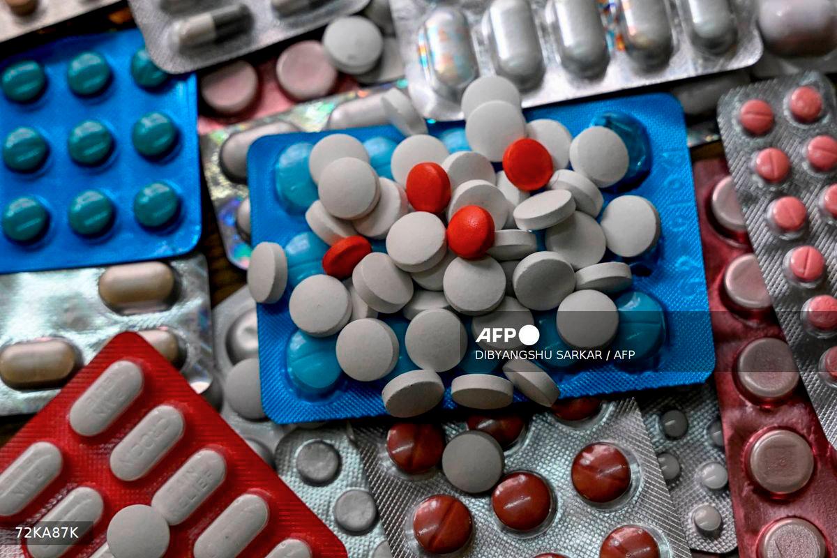This photo illustration shows different tablets of medicines kept together, in Kolkata on August 27, 2025. - AFP