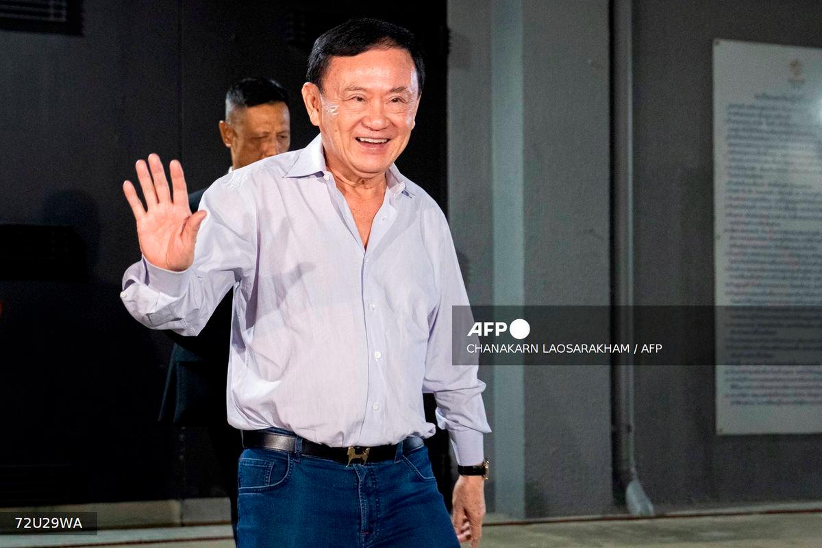 Thailand's former Prime Minister Thaksin Shinawatra leaves the Pheu Thai Party headquarters in Bangkok on August 29, 2025. - AFP