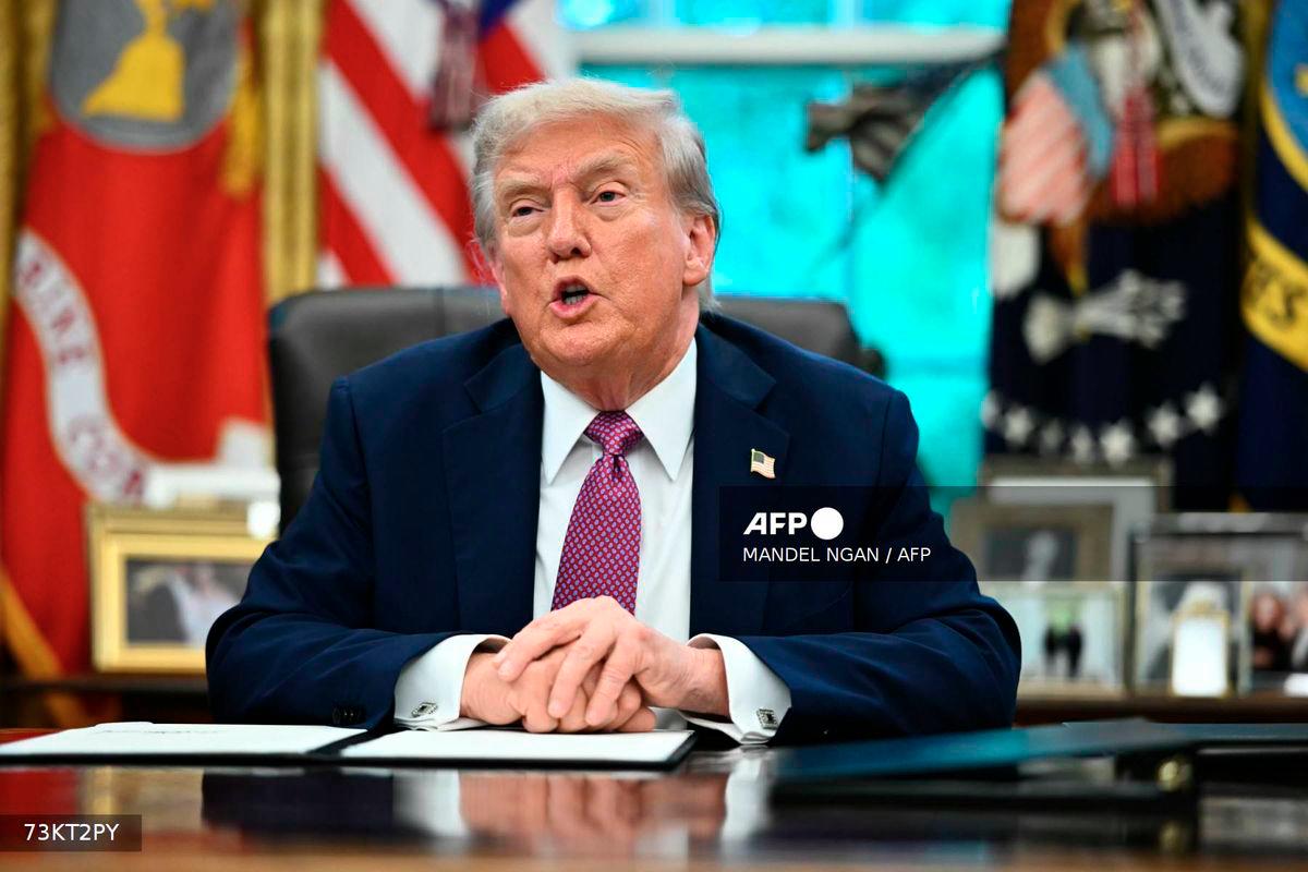 US President Donald Trump speaks to reporters after signing executive orders in the Oval Office of the White House in Washington, DC on September 5, 2025. - AFP