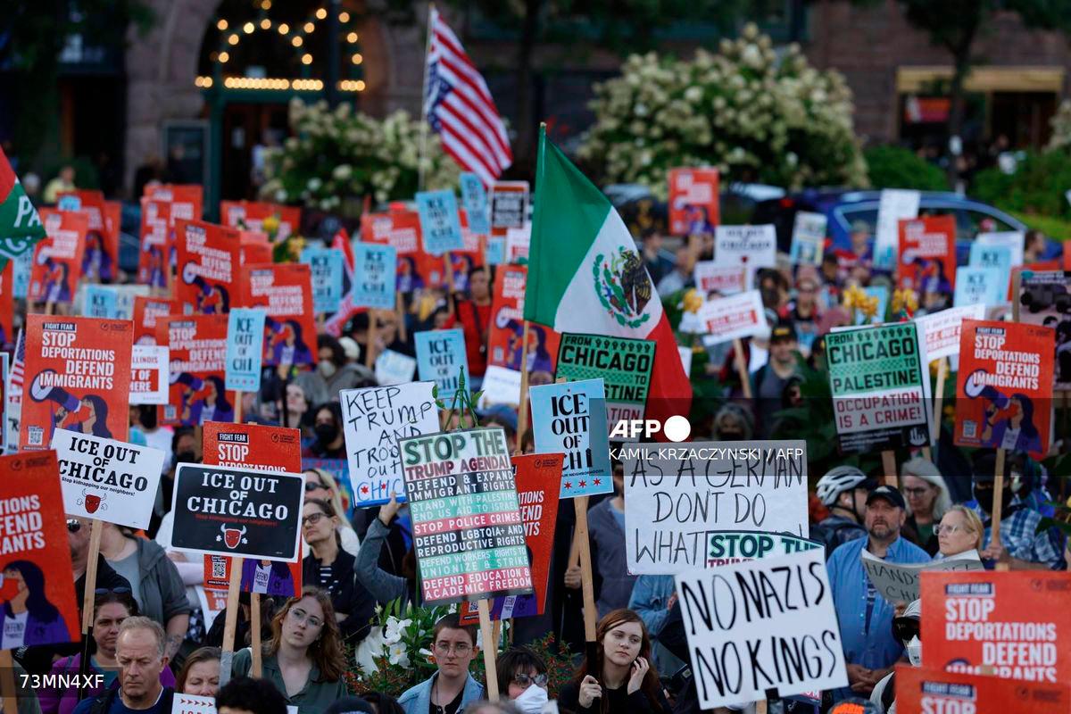 People participate in a demonstration against the planned deployment of National Guard troops in Chicago on September 6, 2025. - AFP