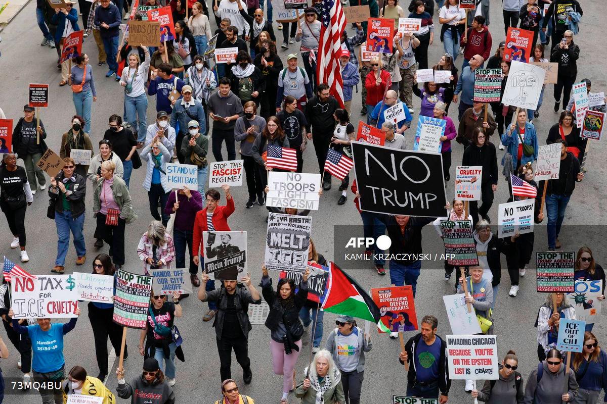 People participate in a demonstration against the planned deployment of National Guard troops in Chicago on September 6, 2025. US President Donald Trump said on September 2 that he will deploy National Guard troops to Chicago, calling the Democratic-run midwestern city a hellhole ravaged by gun crime. - AFP